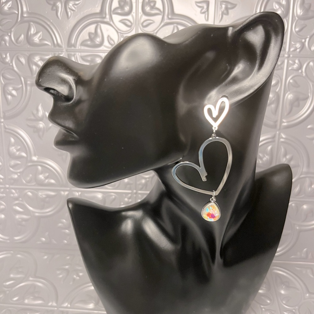 Silver Fluorescent heart shaped earrings,light weight brand new for pierced ears